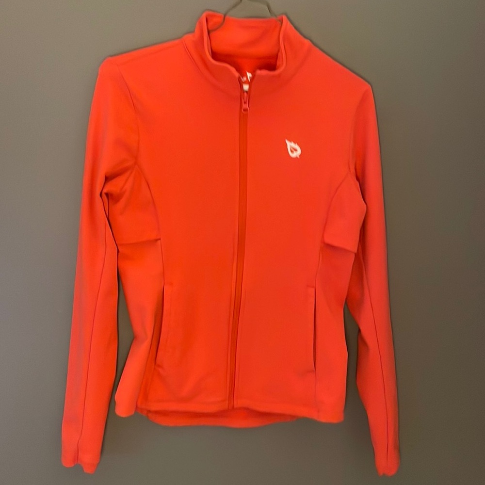 Bright orange right zip up workout jacket